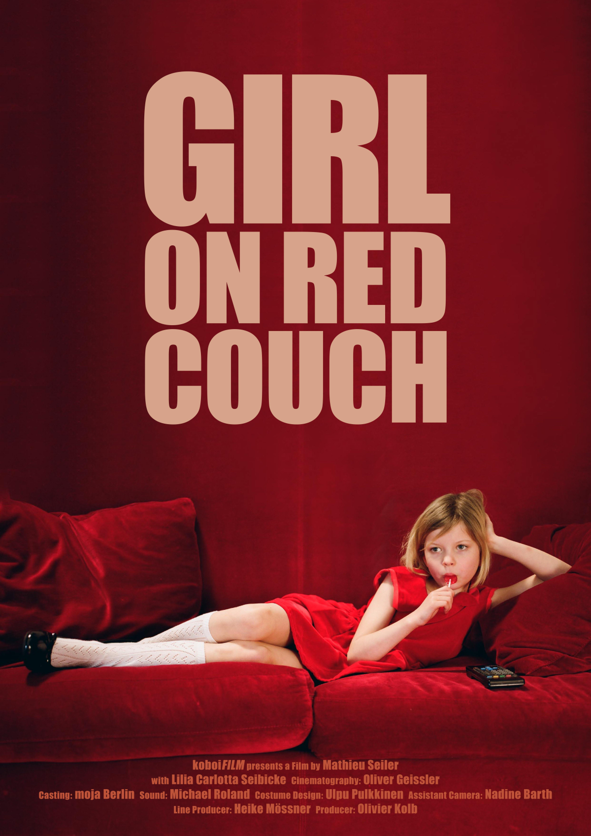 Girl on Red Couch