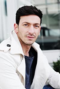 Arnel Taci